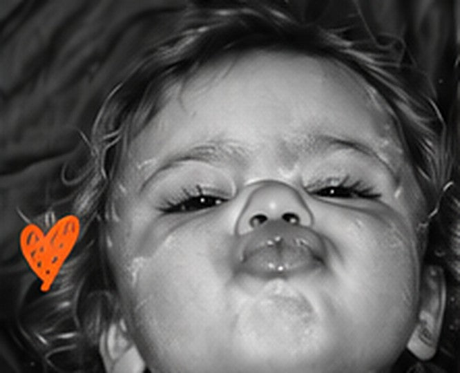Baby pulling a pout, black and white